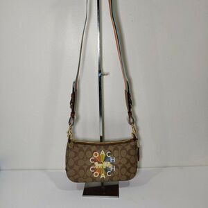 NWT COACH C6817 Jes Baguette In Signature Canvas With Coach Radial Rainbow Khaki